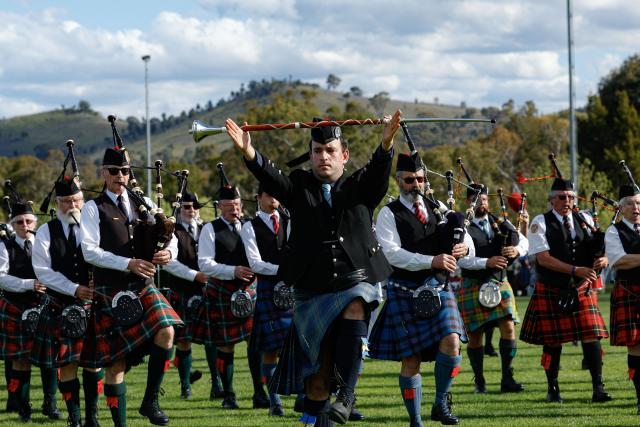 (261010) -- CANBERRA, Oct. 10, 2026 (Xinhua) -- Members of a pipe band perform during the Canberra Highland Gathering in Canberra, Australia, on Oct. 10, 2026. The Scottish cultural event featuring traditional sports, bagpipe and drum performances, dance and traditional food was held in Canberra on Saturday. (Photo by Chu Chen/Xinhua)