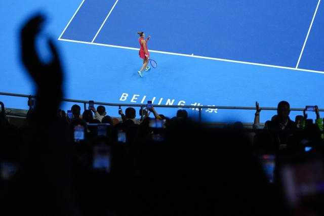 (261010) -- BEIJING, Oct. 10, 2026 (Xinhua) -- Zheng Qinwen celebrates after the women's singles semifinal between Zheng Qinwen of China and Elise Mertens of Belgium at 2026 China Open tennis tournament in Beijing, China, Oct. 10, 2026. (Xinhua/Ju Huanzong)