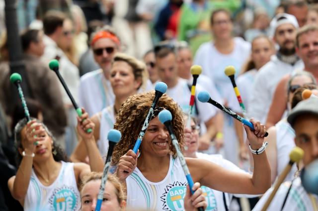 (261010) -- PARIS, Oct. 10, 2026 (Xinhua) -- Performers take part in a parade during the Montmartre Grape Harvest Festival in Paris, France, Oct. 10, 2026. The 93rd edition of the Montmartre Grape Harvest Festival runs from Oct. 7 to 11, featuring a grand parade, musical performances and other festivities. (Xinhua/Wu Huiwo)