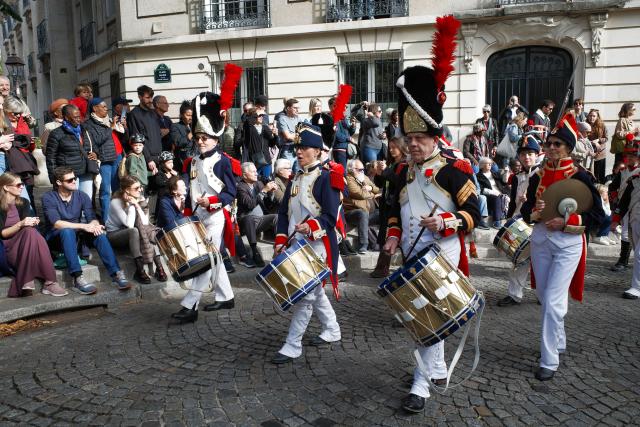 (261010) -- PARIS, Oct. 10, 2026 (Xinhua) -- A band performs during the Montmartre Grape Harvest Festival in Paris, France, Oct. 10, 2026. The 93rd edition of the Montmartre Grape Harvest Festival runs from Oct. 7 to 11, featuring a grand parade, musical performances and other festivities. (Xinhua/Wu Huiwo)