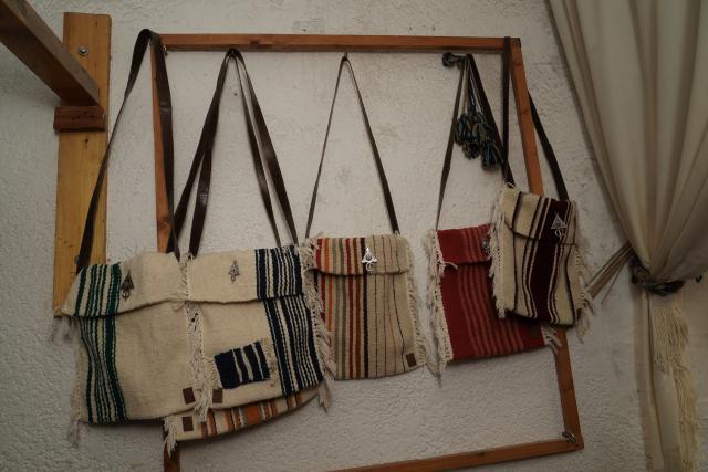 (261010) -- TRIPOLI, Oct. 10, 2026 (Xinhua) -- Photo taken on Sept. 29, 2026 shows handwoven bags in a workshop in Tripoli, Libya. TO GO WITH "Feature: Thread by thread, Libyan women keep an age-old craft alive" (Photo by Hazem Turkia/Xinhua)