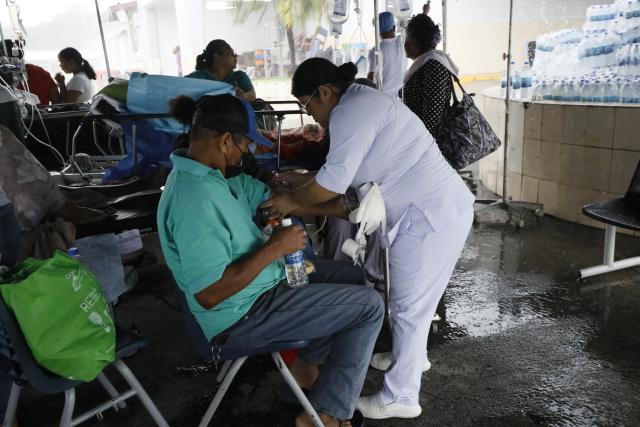 (261010) -- PENONOME, Oct. 10, 2026 (Xinhua) -- Patients receive treatment at a temporary shelter after being evacuated from a damaged hospital in Penonome, Panama, Oct. 10, 2026. Panama declared a state of emergency on Saturday to coordinate relief efforts and assist communities affected by a powerful earthquake that struck the country Friday. (Photo by Daniel Gonzalez/Xinhua)
