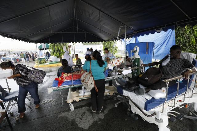 (261010) -- PENONOME, Oct. 10, 2026 (Xinhua) -- Patients receive treatment at a temporary shelter after being evacuated from a damaged hospital in Penonome, Panama, Oct. 10, 2026. Panama declared a state of emergency on Saturday to coordinate relief efforts and assist communities affected by a powerful earthquake that struck the country Friday. (Photo by Daniel Gonzalez/Xinhua)