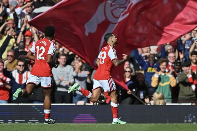 (261011) -- LONDON, Oct. 11, 2026 (Xinhua) -- Bruno Guimaraes (R) of Arsenal celebrates scoring the winning goal during the English Premier League match between Arsenal and Leeds United in London, Britain, on Oct. 10, 2026. (Xinhua)
