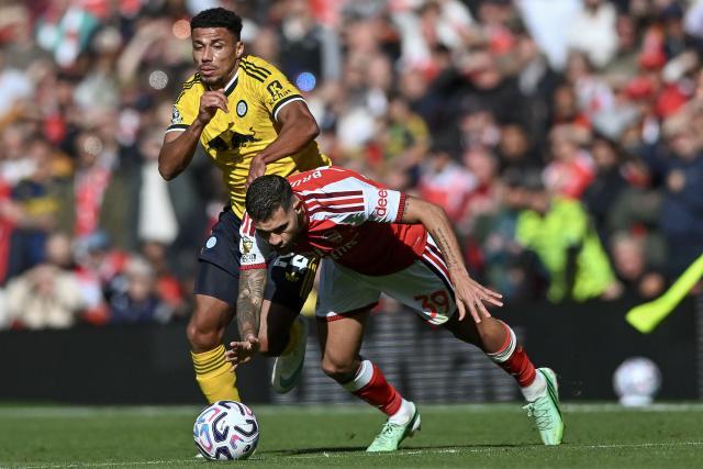 (261011) -- LONDON, Oct. 11, 2026 (Xinhua) -- James Justin (L) of Leeds United battles with Bruno Guimaraes of Arsenal during the English Premier League match between Arsenal and Leeds United in London, Britain, on Oct. 10, 2026. (Xinhua)