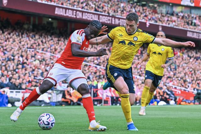 (261011) -- LONDON, Oct. 11, 2026 (Xinhua) -- Bukayo Saka (L) of Arsenal battles with Gabriel Gudmundsson of Leeds United during the English Premier League match between Arsenal and Leeds United in London, Britain, on Oct. 10, 2026. (Xinhua)