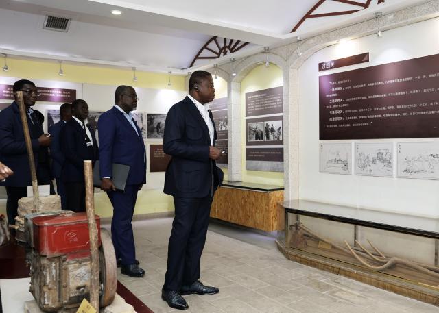 (261011) -- XI'AN, Oct. 11, 2026 (Xinhua) -- President of the Council of Ministers of Togo Faure Essozimna Gnassingbé visits a history museum of Liangjiahe Village in Yanchuan County of Yan'an City, northwest China's Shaanxi Province, Oct. 10, 2026. Faure visited localities in Shaanxi Province from Oct. 9 to 11 during his official visit to China. (Xinhua/Li Yibo)