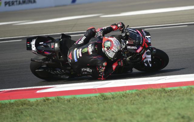 (261011) -- LOMBOK, Oct. 11, 2026 (Xinhua) -- Aprilia Racing's Marco Bezzecchi of Italy races during the MotoGP Grand Prix of Indonesia at Mandalika International circuit in Lombok, Indonesia, Oct. 11, 2026. (Xinhua/Zulkarnain)
