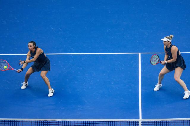 (261011) -- BEIJING, Oct. 11, 2026 (Xinhua) -- Gabriela Dabrowski (Canada)/Luisa Stefani (L, Brazil) compete during the women's doubles final against Katerina Siniakova (the Czech Republic)/Zhang Shuai (China) at 2026 China Open tennis tournament in Beijing, China, Oct. 11, 2026. (Xinhua/Sun Fei)