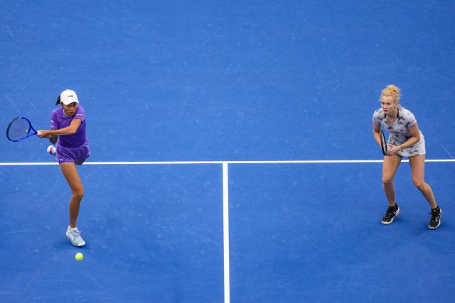 (261011) -- BEIJING, Oct. 11, 2026 (Xinhua) -- Katerina Siniakova (the Czech Republic)/Zhang Shuai (L, China) compete during the women's doubles final against Gabriela Dabrowski (Canada)/Luisa Stefani (Brazil) at 2026 China Open tennis tournament in Beijing, China, Oct. 11, 2026. (Xinhua/Sun Fei)