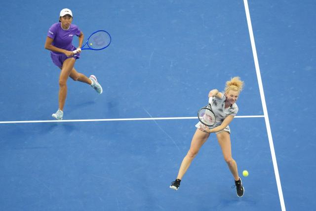 (261011) -- BEIJING, Oct. 11, 2026 (Xinhua) -- Katerina Siniakova (R) of the Czech Republic/Zhang Shuai of China compete during the women's doubles final against Gabriela Dabrowski (R) of Canada/Luisa Stefani of Brazil at 2026 China Open tennis tournament in Beijing, China, Oct. 11, 2026. (Xinhua/Ju Huanzong)