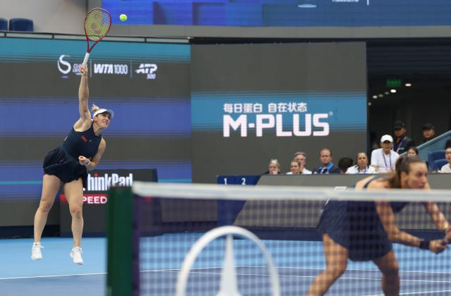 (261011) -- BEIJING, Oct. 11, 2026 (Xinhua) -- Gabriela Dabrowski (L) of Canada/Luisa Stefani of Brazil compete during the women's doubles final against Katerina Siniakova of the Czech Republic/Zhang Shuai of China at 2026 China Open tennis tournament in Beijing, China, Oct. 11, 2026. (Xinhua/Zhang Chenlin)