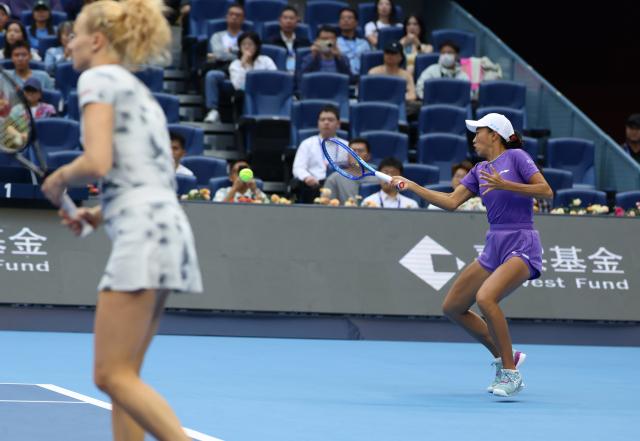 (261011) -- BEIJING, Oct. 11, 2026 (Xinhua) -- Katerina Siniakova of the Czech Republic/Zhang Shuai (R) of China compete during the women's doubles final against Gabriela Dabrowski of Canada/Luisa Stefani of Brazil at 2026 China Open tennis tournament in Beijing, China, Oct. 11, 2026. (Xinhua/Zhang Chenlin)