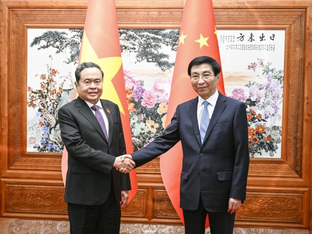 (261011) -- BEIJING, Oct. 11, 2026 (Xinhua) -- Wang Huning, chairman of the National Committee of the Chinese People's Political Consultative Conference, meets with Tran Thanh Man, chairman of the National Assembly of Vietnam, in Beijing, capital of China, Oct. 11, 2026. (Xinhua/Zhang Ling)