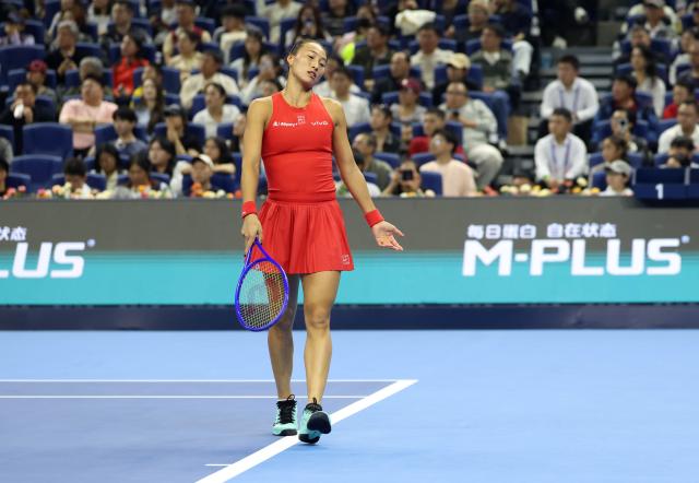 (261011) -- BEIJING, Oct. 11, 2026 (Xinhua) -- Zheng Qinwen reacts during the women's singles final between Zheng Qinwen of China and Mirra Andreeva of Russia at 2026 China Open tennis tournament in Beijing, China, Oct. 11, 2026. (Xinhua/Zhang Chenlin)