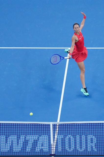 (261011) -- BEIJING, Oct. 11, 2026 (Xinhua) -- Zheng Qinwen hits a return during the women's singles final between Zheng Qinwen of China and Mirra Andreeva of Russia at 2026 China Open tennis tournament in Beijing, China, Oct. 11, 2026. (Xinhua/Ju Huanzong)