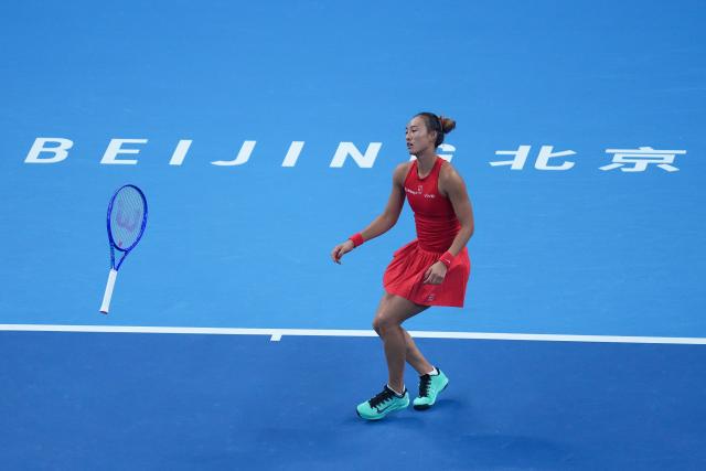 (261011) -- BEIJING, Oct. 11, 2026 (Xinhua) -- Zheng Qinwen celebrates victory after the women's singles final between Zheng Qinwen of China and Mirra Andreeva of Russia at 2026 China Open tennis tournament in Beijing, China, Oct. 11, 2026. (Xinhua/Ju Huanzong)