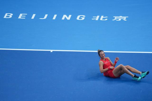 (261011) -- BEIJING, Oct. 11, 2026 (Xinhua) -- Zheng Qinwen celebrates victory after the women's singles final between Zheng Qinwen of China and Mirra Andreeva of Russia at 2026 China Open tennis tournament in Beijing, China, Oct. 11, 2026. (Xinhua/Ju Huanzong)