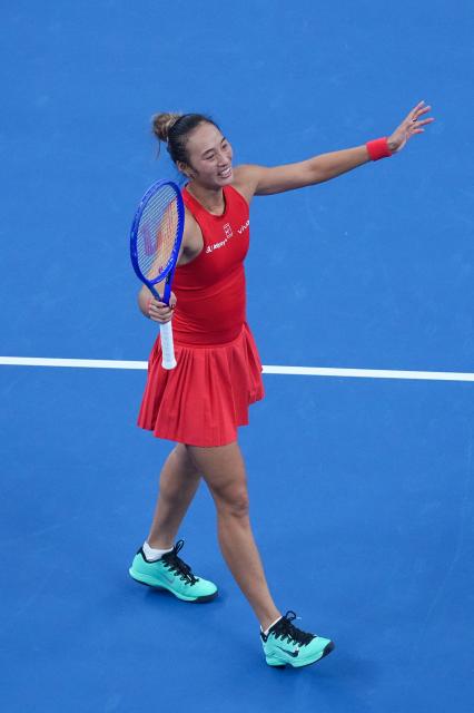 (261011) -- BEIJING, Oct. 11, 2026 (Xinhua) -- Zheng Qinwen reacts after the women's singles final between Zheng Qinwen of China and Mirra Andreeva of Russia at 2026 China Open tennis tournament in Beijing, China, Oct. 11, 2026. (Xinhua/Ju Huanzong)