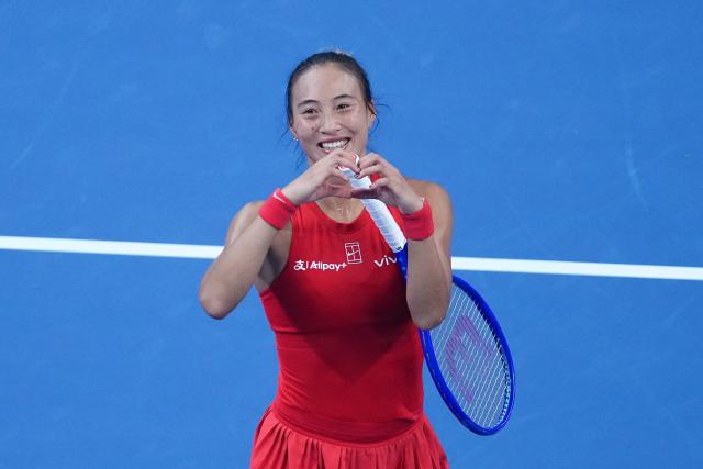(261011) -- BEIJING, Oct. 11, 2026 (Xinhua) -- Zheng Qinwen reacts after the women's singles final between Zheng Qinwen of China and Mirra Andreeva of Russia at 2026 China Open tennis tournament in Beijing, China, Oct. 11, 2026. (Xinhua/Ju Huanzong)