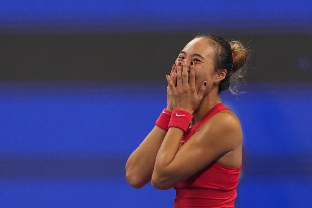 (261011) -- BEIJING, Oct. 11, 2026 (Xinhua) -- Zheng Qinwen reacts after the women's singles final between Zheng Qinwen of China and Mirra Andreeva of Russia at 2026 China Open tennis tournament in Beijing, China, Oct. 11, 2026. (Xinhua/Sun Fei)