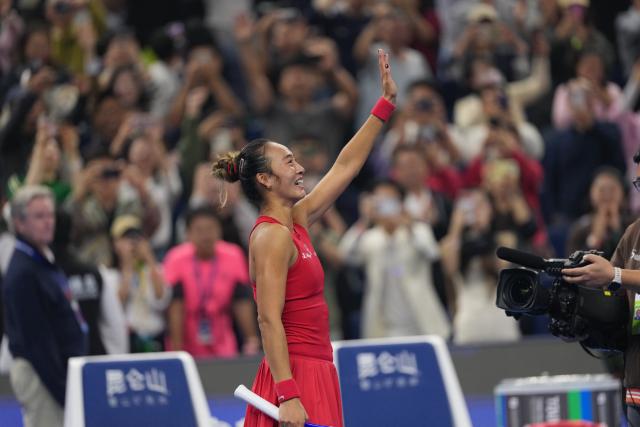 (261011) -- BEIJING, Oct. 11, 2026 (Xinhua) -- Zheng Qinwen greets the spectators after the women's singles final between Zheng Qinwen of China and Mirra Andreeva of Russia at 2026 China Open tennis tournament in Beijing, China, Oct. 11, 2026. (Xinhua/Sun Fei)