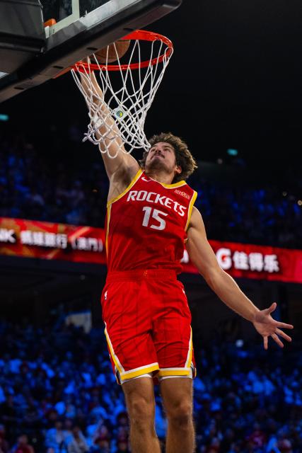 (261011) -- MACAO, Oct. 11, 2026 (Xinhua) -- Reed Sheppard of Houston Rockets dunks during the 2026-2027 NBA preseason game between Dallas Mavericks and Houston Rockets in Macao, south China, on Oct. 11, 2026. (Xinhua/Cheong Kam Ka)