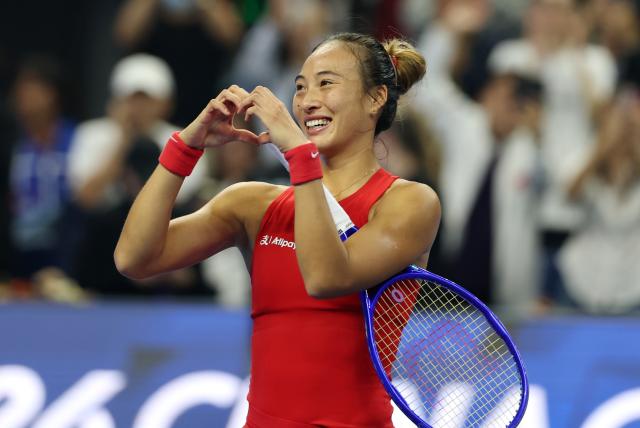 (261011) -- BEIJING, Oct. 11, 2026 (Xinhua) -- Zheng Qinwen reacts after the women's singles final between Zheng Qinwen of China and Mirra Andreeva of Russia at 2026 China Open tennis tournament in Beijing, China, Oct. 11, 2026. (Xinhua/Zhang Chenlin)