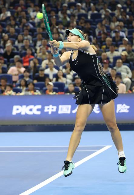 (261011) -- BEIJING, Oct. 11, 2026 (Xinhua) -- Mirra Andreeva hits a return during the women's singles final between Zheng Qinwen of China and Mirra Andreeva of Russia at 2026 China Open tennis tournament in Beijing, China, Oct. 11, 2026. (Xinhua/Zhang Chenlin)
