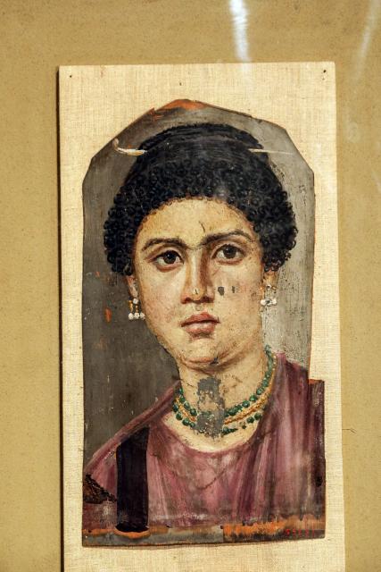 (261011) -- CAIRO, Oct. 11, 2026 (Xinhua) -- Photo taken on Oct. 11, 2026 shows a Fayum portrait which will be displayed at Rome's Ara Pacis Museum, at a press conference in Cairo, Egypt. Egypt has restored the Tondo of the Two Brothers, an ancient Egyptian portrait from the Roman period that will be displayed outside the country for the first time, Egyptian Minister of Tourism and Antiquities Sherif Fathy announced Sunday. Fathy made the announcement at a press conference at the Egyptian Museum in Tahrir, Cairo, where the restored masterpiece was unveiled. It will be displayed at Rome's Ara Pacis Museum as part of the exhibition "The Power of the Portrait: Egypt and Rome, Faces of Fayum," running from Nov. 5, 2026, to May 2, 2027. (Xinhua/Ahmed Gomaa)