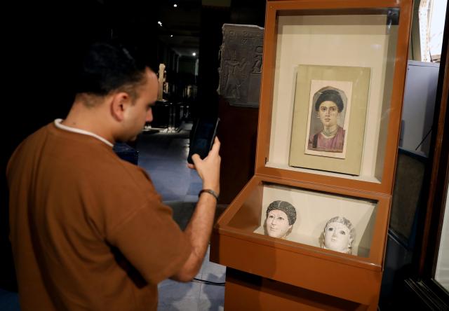 (261011) -- CAIRO, Oct. 11, 2026 (Xinhua) -- Photo taken on Oct. 11, 2026 shows a Fayum portrait which will be displayed at Rome's Ara Pacis Museum, at a press conference in Cairo, Egypt. Egypt has restored the Tondo of the Two Brothers, an ancient Egyptian portrait from the Roman period that will be displayed outside the country for the first time, Egyptian Minister of Tourism and Antiquities Sherif Fathy announced Sunday. Fathy made the announcement at a press conference at the Egyptian Museum in Tahrir, Cairo, where the restored masterpiece was unveiled. It will be displayed at Rome's Ara Pacis Museum as part of the exhibition "The Power of the Portrait: Egypt and Rome, Faces of Fayum," running from Nov. 5, 2026, to May 2, 2027. (Xinhua/Ahmed Gomaa)