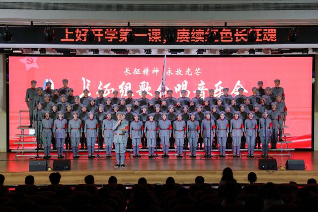 (261012) -- NANCHANG, Oct. 12, 2026 (Xinhua) -- The Long March Origin choir perform at a middle school in Yudu County, east China's Jiangxi Province, Sept. 3, 2026. This year marks the 90th anniversary of the victory of the Long March. As one of its important starting points, Yudu County in east China's Jiangxi Province, a place best known as the starting point of the Long March by the Central Red Army, the historic military maneuver in modern Chinese history, has become more than a place of remembrance.
   It was from Yudu that more than 80,000 Red Army soldiers crossed the Yudu River and began the Long March in 1934, the roughly 12,500-kilometer trek later described by American journalist Harrison Salisbury as "a great human epic."
   On the stone tablet in front of the memorial museum of the Central Red Army's departure for the Long March here in Yudu, three Chinese characters meaning "Long March Origin" are engraved. The "Long March Origin" not only indicates that this place was the starting point of the important strategic transfer of the Red Army at that time, but also carries the profound understanding of the Long March spirit by the people of Yudu to this day.
   You can see the words "Long March Origin" frequently in Yudu, and the Long March Origin choir is a prominent presence.
   In this red revolutionary land of Yudu, almost everyone can share family stories connected to the Red Army's Long March. The Long March Origin choir, established in 2010, is composed of over 100 descendants of Red Army soldiers from all walks of life in the county. Over these years, they have not only performed the "Suite of Songs on the Long March" in Yudu and across Jiangxi in their spare time, but also carried forward the spirit of the Long March along the Long March route with their songs.
   The choir's first performance was staged on June 30, 2011, which was dedicated to the 90th anniversary of the founding of the Communist Party of China. So far the choir has performed over 730 charity performances. "We hope that the choir will complete 1,000 performances by the 100th anniversary of the victory of the Long March," said Zou Weimin, the director of the choir. (Xinhua/Wang Jingqiang)