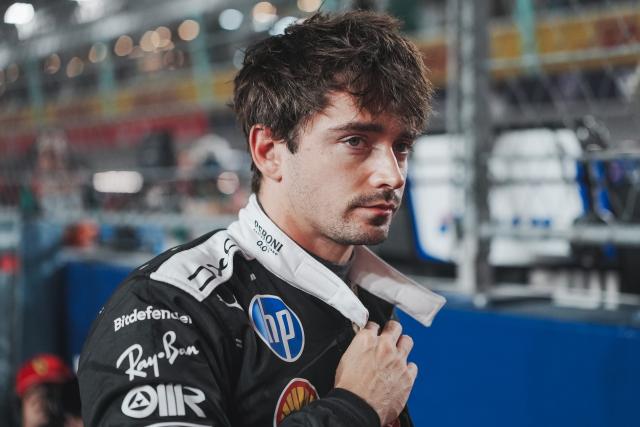 (261012) -- SINGAPORE, Oct. 12, 2026 (Xinhua) -- Ferrari's Charles Leclerc of Monaco reacts before the Formula One Singapore Grand Prix at the Marina Bay Street Circuit in Singapore, on Oct. 11, 2026. (Photo by Xu Mingnan/Xinhua)