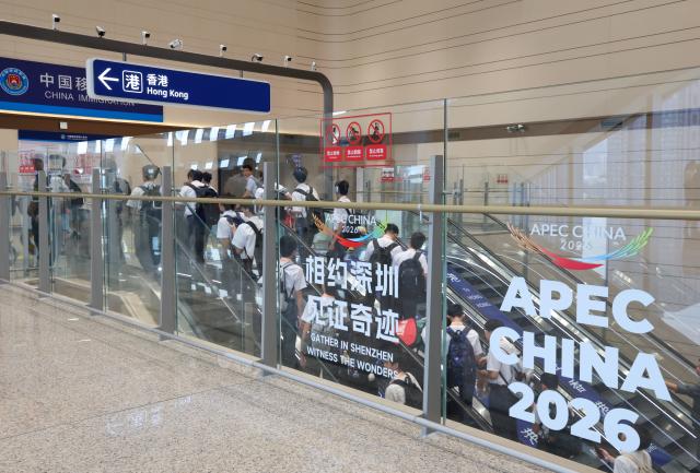 (261012) -- SHENZHEN, Oct. 12, 2026 (Xinhua) -- Students leave for Hong Kong via the Huanggang Port in Shenzhen, south China's Guangdong Province, Oct. 12, 2026. The redeveloped Huanggang Port opened at 6:30 a.m. (local time) on Monday, streamlining cross-border passenger travel between China's Shenzhen and Hong Kong Special Administrative Region. (Xinhua/Liang Xu)