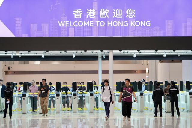 (261012) -- HONG KONG, Oct. 12, 2026 (Xinhua) -- Passengers arrive in Hong Kong via Huanggang Port, south China, Oct. 12, 2026. The redeveloped Huanggang Port opened at 6:30 a.m. (local time) on Monday, streamlining cross-border passenger travel between China's Shenzhen and Hong Kong Special Administrative Region. (Xinhua/Lui Siu Wai)