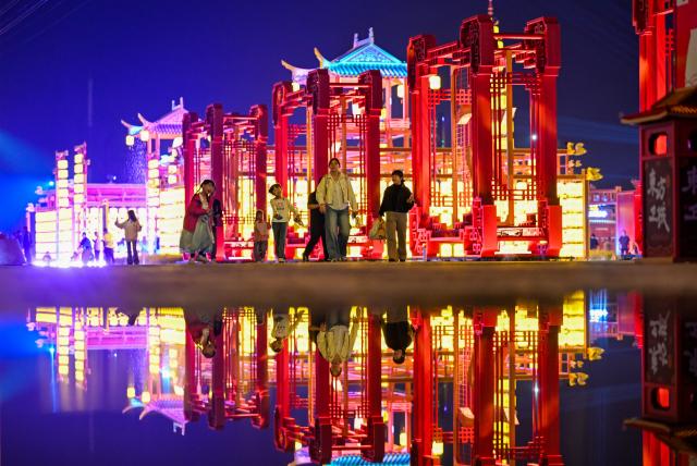 (261012) -- TIANJIN, Oct. 12, 2026 (Xinhua) -- People visit the Eastern Acropolis in Binhai New Area of Tianjin, north China, Oct. 11, 2026. Eastern Acropolis, a cultural and tourism complex in Beitang ancient town of Tianjin, launched its trial operation on Sunday. The complex, built upon the town's original infrastructure and themed on Tianjin's history and culture, offers immersive performances, cultural experiences, specialty stores and leisure options for visitors. (Xinhua/Zhao Zishuo)