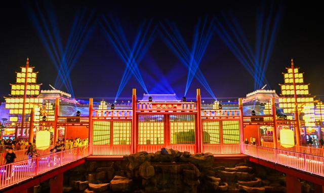 (261012) -- TIANJIN, Oct. 12, 2026 (Xinhua) -- This photo taken on Oct. 11, 2026 shows a night view of the Eastern Acropolis in Binhai New Area of Tianjin, north China. Eastern Acropolis, a cultural and tourism complex in Beitang ancient town of Tianjin, launched its trial operation on Sunday. The complex, built upon the town's original infrastructure and themed on Tianjin's history and culture, offers immersive performances, cultural experiences, specialty stores and leisure options for visitors. (Xinhua/Zhao Zishuo)