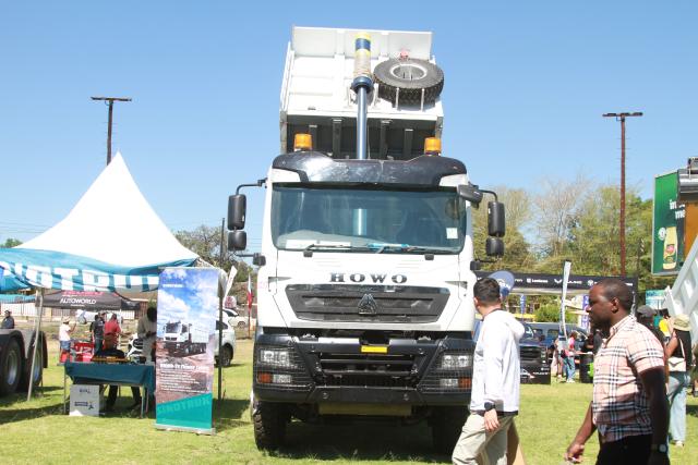 (261012) -- HARARE, Oct. 12, 2026 (Xinhua) -- A truck is displayed at the China-Zimbabwe Commodity Expo and Job Fair in Harare, Zimbabwe, on Oct. 11, 2026. Chinese heavy-duty truck brands attracted strong interest from visitors at the three-day China-Zimbabwe Commodity Expo and Job Fair, which concluded Sunday in the Zimbabwean capital of Harare, reflecting growing local demand for reliable commercial vehicles.
   TO GO WITH "Chinese trucks roll into spotlight at Zimbabwe expo" (Photo by Tafara Mugwara/Xinhua)