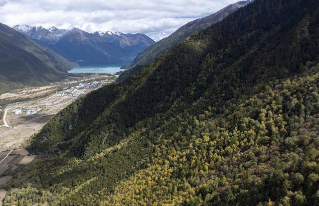 (261012) -- NYINGCHI, Oct. 12, 2026 (Xinhua) -- An aerial drone photo taken on Oct. 12, 2026 shows scenery near Basomtso scenic area, a national 5A tourist attraction, in Nyingchi, southwest China's Xizang Autonomous Region. (Xinhua/Li Jian)