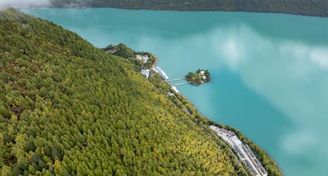 (261012) -- NYINGCHI, Oct. 12, 2026 (Xinhua) -- An aerial drone photo taken on Oct. 12, 2026 shows scenery in Basomtso scenic area, a national 5A tourist attraction, in Nyingchi, southwest China's Xizang Autonomous Region. (Xinhua/Jigme Dorje)