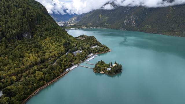 (261012) -- NYINGCHI, Oct. 12, 2026 (Xinhua) -- An aerial drone photo taken on Oct. 12, 2026 shows scenery in Basomtso scenic area, a national 5A tourist attraction, in Nyingchi, southwest China's Xizang Autonomous Region. (Xinhua/Jigme Dorje)