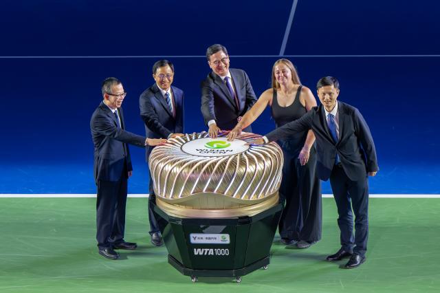 (261012) -- WUHAN, Oct. 12, 2026 (Xinhua) -- Jelena Ostapenko (2nd R) of Latvia attends the opening ceremony of the 2026 Wuhan Open tennis tournament in Wuhan, capital of central China's Hubei Province, Oct. 12, 2026. (Xinhua/Du Zixuan)