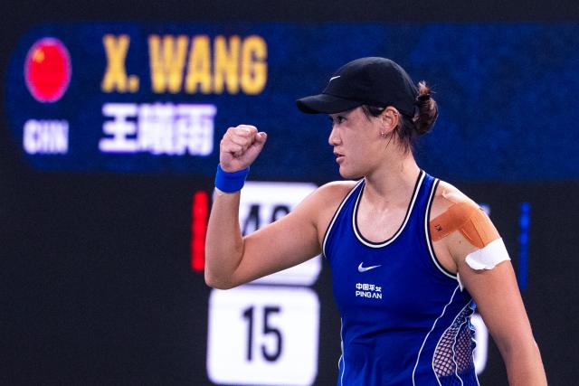 (261012) -- WUHAN, Oct. 12, 2026 (Xinhua) -- Wang Xiyu celebrates after the women's sinlges round of 64 match between Wang Xiyu of China and Wang Xinyu of China of the 2026 Wuhan Open tennis tournament in Wuhan, capital of central China's Hubei Province, Oct. 12, 2026. (Xinhua/Xiao Yijiu)
