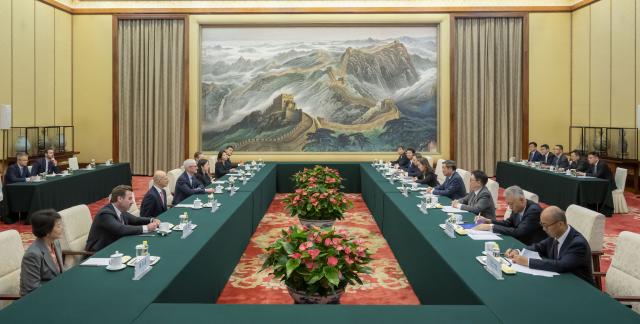 (261012) -- BEIJING, Oct. 12, 2026 (Xinhua) -- Chinese Vice Premier He Lifeng, also a member of the Political Bureau of the Communist Party of China Central Committee, meets with Tim Cook, executive chairman of the board of directors of Apple Inc., at the Great Hall of the People in Beijing, capital of China, Oct. 12, 2026. (Xinhua/Zhai Jianlan)