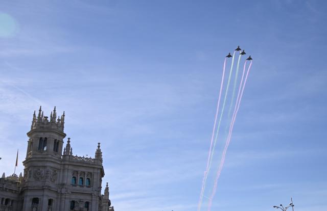 (261012) -- MADRID, Oct. 12, 2026 (Xinhua) -- Aircraft perform during a military parade commemorating the National Day in Madrid, Spain, Oct. 12, 2026. (Xinhua/Cheng Min)