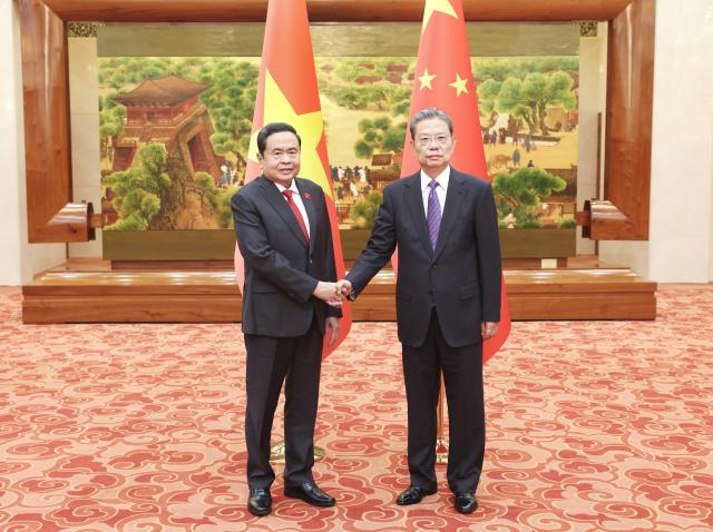 (261012) -- BEIJING, Oct. 12, 2026 (Xinhua) -- Zhao Leji, chairman of the National People's Congress Standing Committee, holds talks with Tran Thanh Man, chairman of the National Assembly of Vietnam, in Beijing, capital of China, Oct. 12, 2026. They co-chaired the second session of the joint committee between the legislative bodies. (Xinhua/Pang Xinglei)