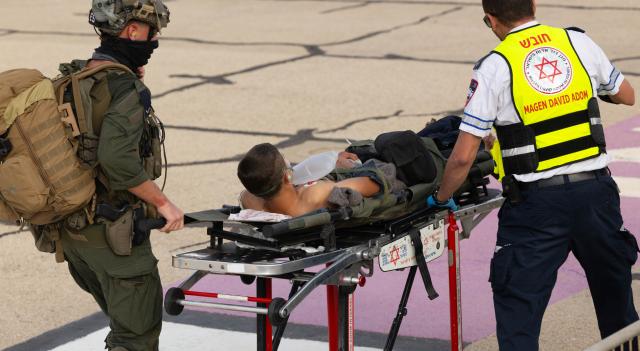 (261012) -- HAIFA, Oct. 12, 2026 (Xinhua) -- An injured person is transferred to Rambam Hospital in Haifa, northern Israel, Oct. 12, 2026. One person was killed and 19 others injured in an explosion of unexploded ordnance during a school trip in northern Israel on Monday, Israeli police and the national emergency service Magen David Adom said in separate statements. (JINI via Xinhua)