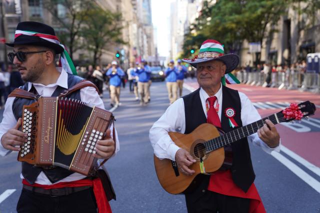 (261012) -- NEW YORK, Oct. 12, 2026 (Xinhua) -- Folk musicians perform during the Columbus Day parade on Manhattan's Fifth Avenue in New York, the United States, Oct. 12, 2026. The Columbus Day, which marks the landing of the Italian-born explorer Christopher Columbus, was held here on Monday. (Xinhua/Zhang Fengguo)