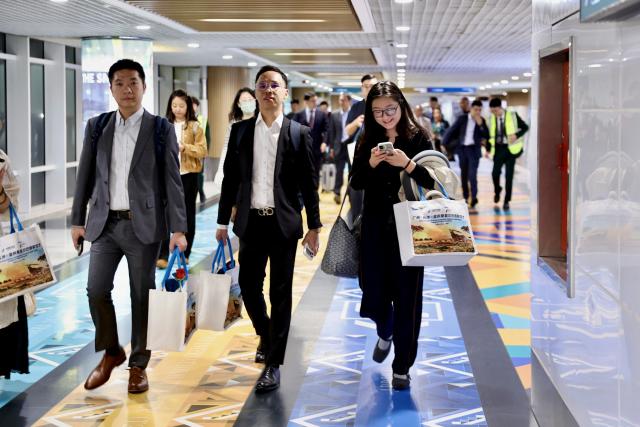 (261013) -- ADDIS ABABA, Oct. 13, 2026 (Xinhua) -- Passengers of a flight operated by China Southern Airlines arrive at Addis Ababa Bole International Airport in Addis Ababa, capital of Ethiopia, on Oct. 12, 2026. A China Southern Airlines flight landed in Ethiopia on Monday night, marking the successful inaugural flight of a new and only air route operated by a Chinese carrier between China and Ethiopia.
  TO GO WITH "New air route launched between China, Ethiopia" (Xinhua/Geng Xinning)