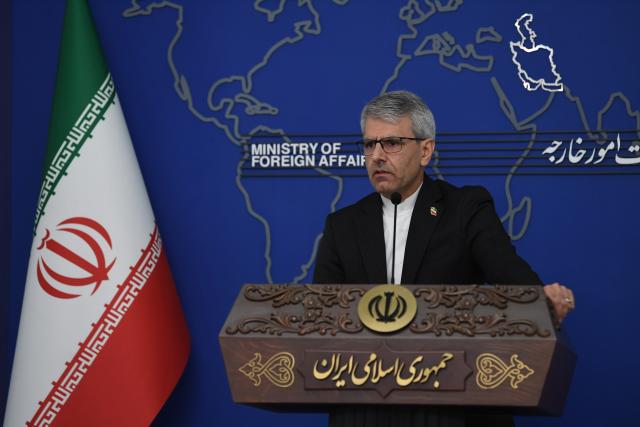 (261013) -- TEHRAN, Oct. 13, 2026 (Xinhua) -- Iran's Foreign Ministry spokesman Esmaeil Baghaei attends a weekly press conference in Tehran, Iran, Oct. 12, 2026. Baghaei said on Monday the country is reviewing the latest points raised by the United States in response to Iran's positions and will convey its views to mediators as soon as the review is concluded. (Xinhua/Shadati)